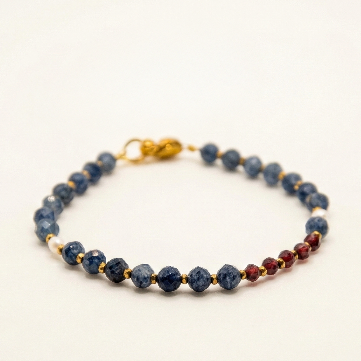 Bransoletka z kamieni: jadeit, złoty hematyt, jadeit niebieski, perła